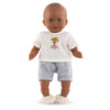 t-shirt et short poupée Corolle sur poupée de 30 cm, offrant une tenue décontractée pour les petits explorateurs.