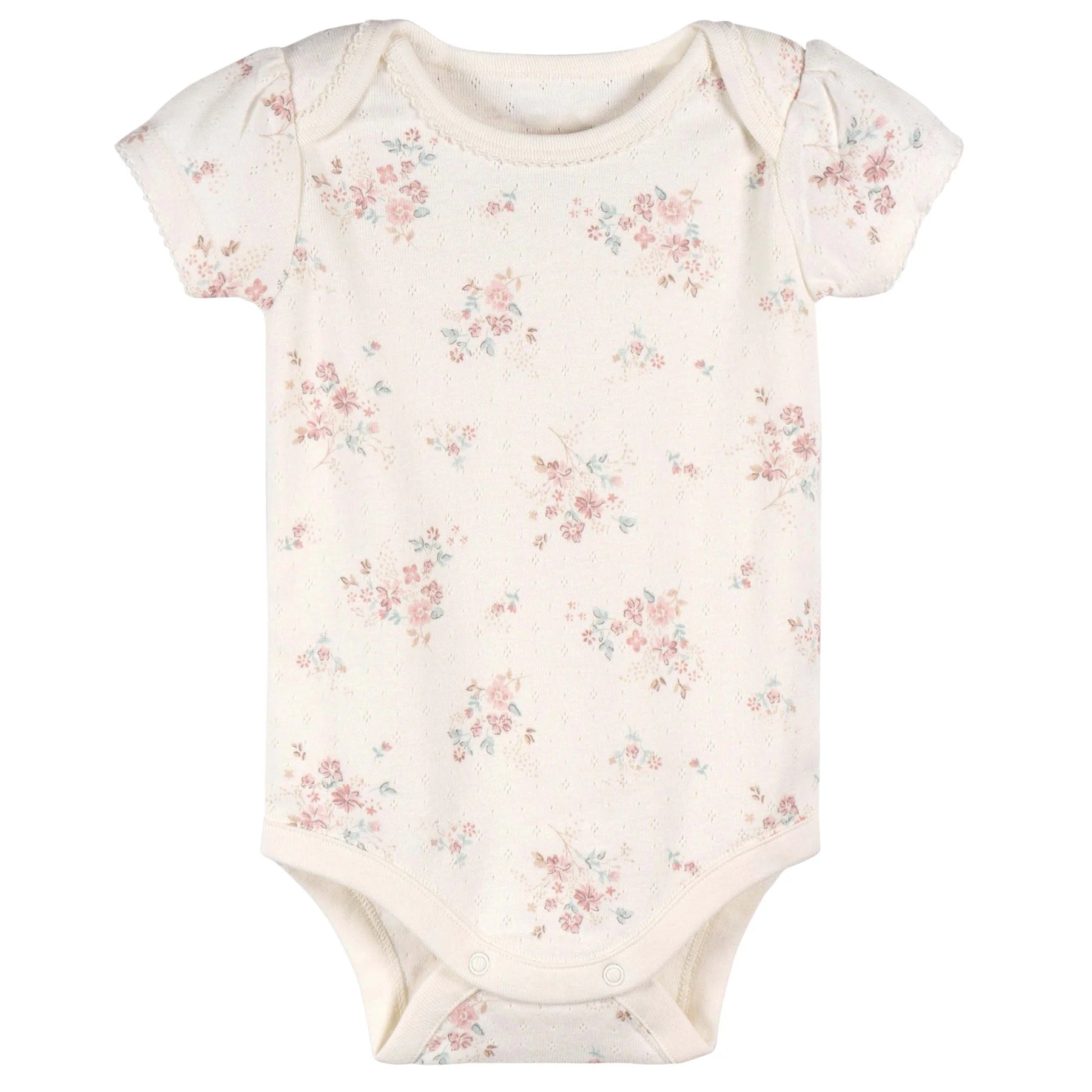 cache-couches bébé rose à manches courtes avec motifs floraux sur fond clair