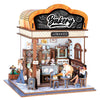 Buki France - Diorama Boulangerie, mini boulangerie DIY Buki avec une scène détaillée de café et pâtisseries.