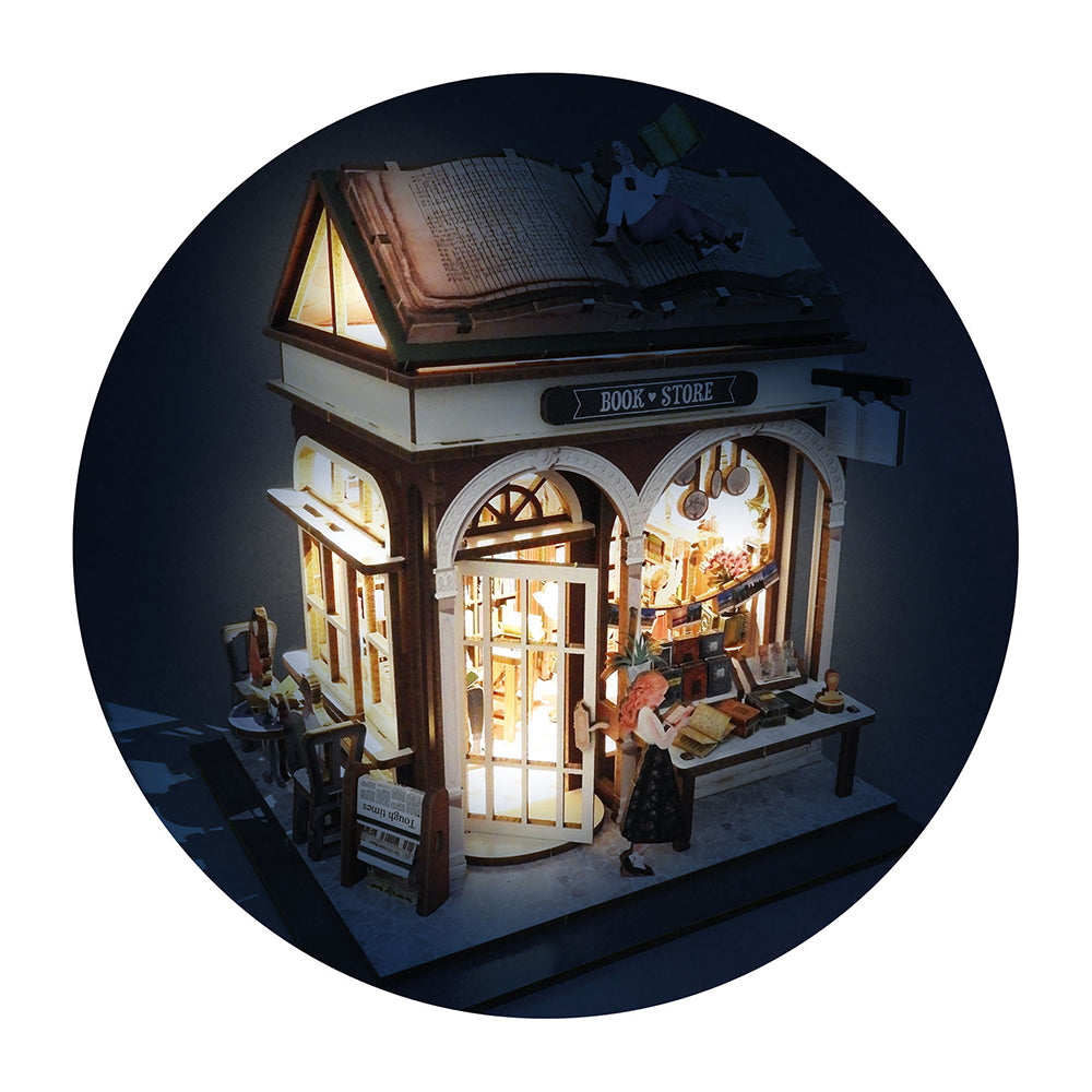 Diorama de mini librairie DIY Buki, charmante librairie illuminée avec une femme lisant.