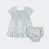 Ensemble robe bleu poudré imprimé floral avec jupe à volants et culotte confortable.