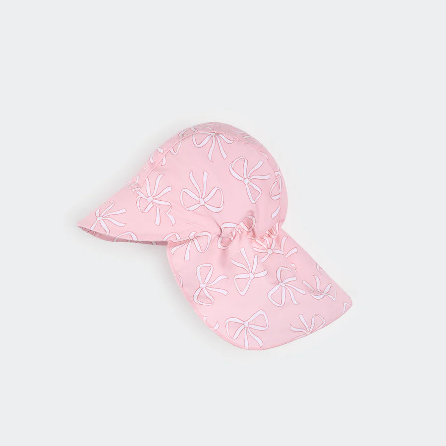 Chapeau à rabat rose pâle imprimé nœuds, idéal pour protéger du soleil avec style.