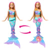 Barbie sirène magique fleurie blonde avec queue scintillante et motifs floraux.
