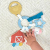 itzy-ritzy Jouet d'activité de dentition Bitzy Busy Ring ferme