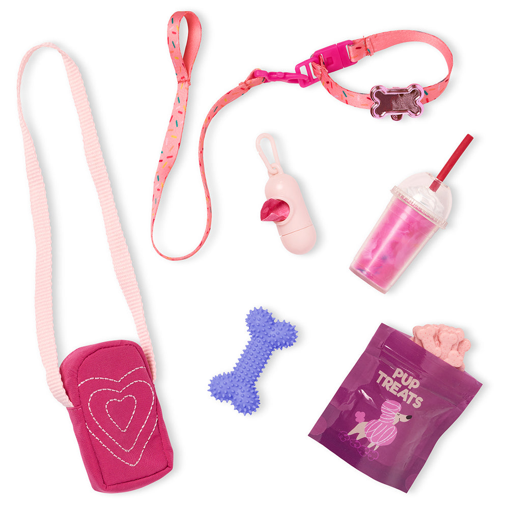 Accessoires pour poupée Our Generation Inès et chiot Poméranien, incluant collier, jouets et friandises.