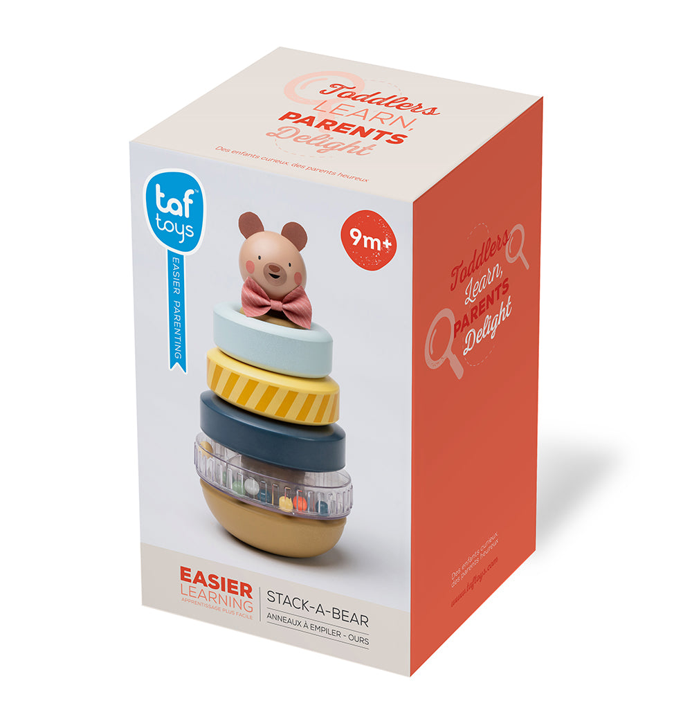 Emballage des anneaux à empiler Taf Toys avec un ourson et des couleurs attrayantes pour l'apprentissage des tout-petits.