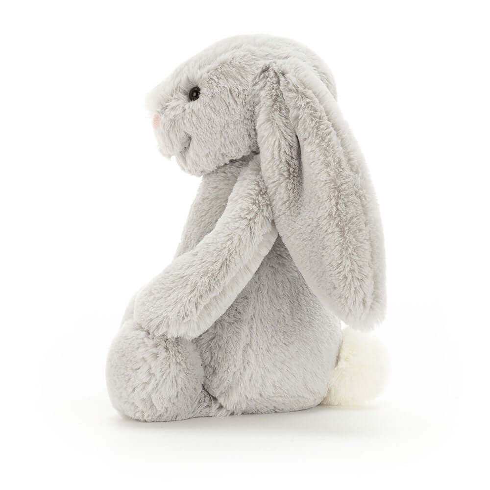 Jellycat Bashful Silver Bunny in a seated position showcasing its soft gray fur and floppy ears.