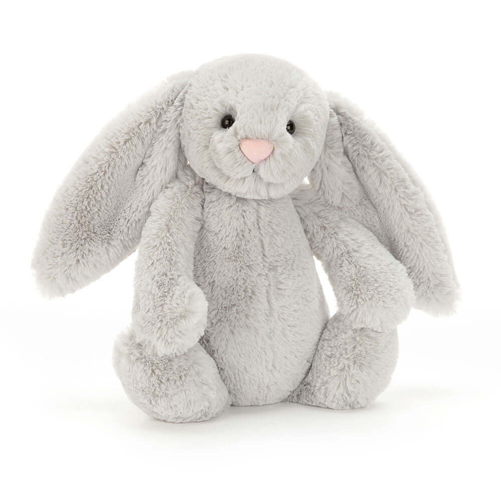 Jellycat Bashful Silver Bunny, un adorable lapin en peluche gris avec de grandes oreilles.