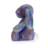 Jellycat Zodihop Luxe Bunny en peluche aux couleurs pastel, assis avec des oreilles longues et douces.