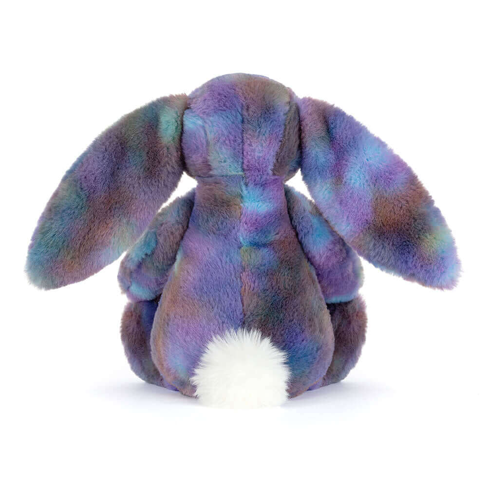 Vue arrière du Jellycat Zodihop Luxe Bunny en peluche colorée avec grandes oreilles.