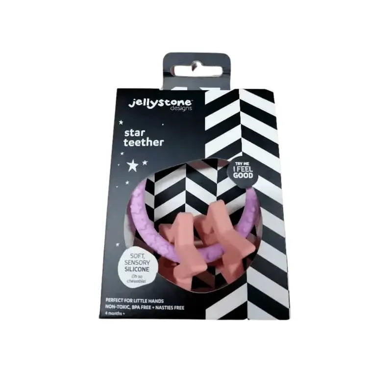 Anneau de dentition silicone rose avec étoiles, conçu pour apaiser les gencives des bébés. Parfait pour les petites mains.